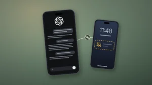 News illustration: two smartphones on a sage-green surface, linked by a thin cream line with a chain icon. The larger phone shows a dark chat app with the white OpenAI logo at the top and a long thread of message bubbles; the smaller phone shows a lock screen where the notification slot is an empty dashed amber box with a crossed-out bell.